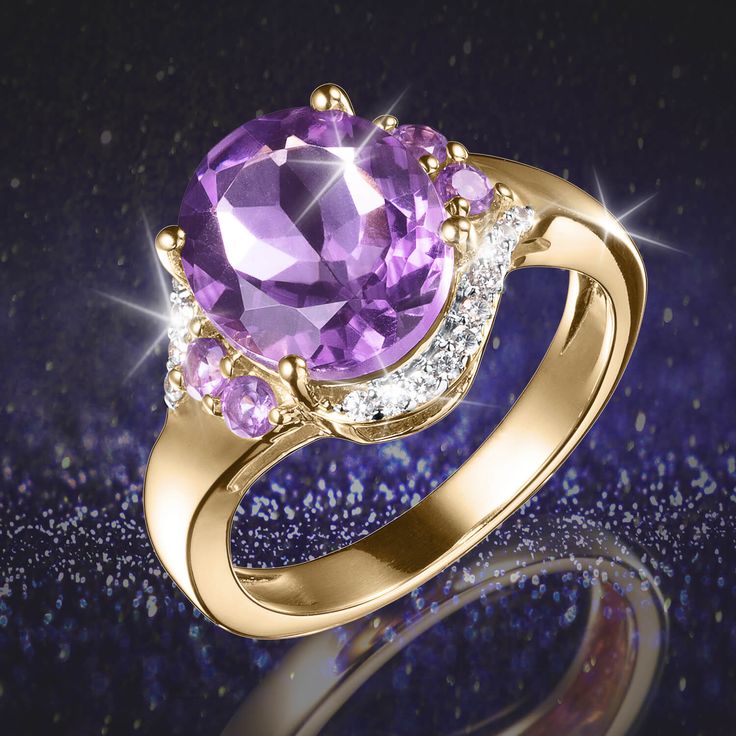 An endearing design that is meant to be worn every day. Finely crafted from sterling silver, finished in luxurious 18k yellow gold. An oval cut Amethyst sits at the heart, flanked with more shimmering Amethysts and complemented with sparkling ice white Diamondeau®, flawless simulated diamond. This is a ring that makes a statement on its own, or mixed up with other rings to give an edgy look. Luxury Elegant Purple Amethyst Ring, Luxury Hallmarked Elegant Amethyst Ring, Luxury Elegant Faceted Amethyst Ring, Luxury Purple Amethyst 14k Gold Ring, Luxury Purple Amethyst Spiritual Ring, Roman Goddess, Ladies Ring, Sparkling Ice, Moon Flower