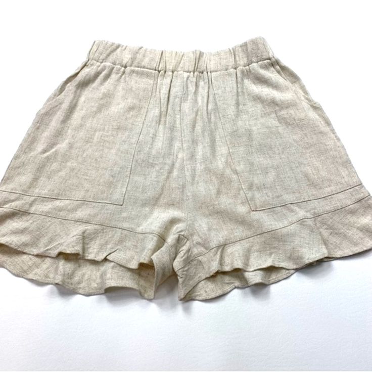 Blooming Rose Summer Soire Shorts Size Small Waist 24” Rise 13” Inseam 3” Measurements Are Approximate 45% Linen 55% Polyester Cotton Shorts With Ruffle Hem, Cotton Bloomers With Ruffle Hem For Summer, Casual Summer Bloomers With Elastic Waistband, Short Cotton Bottoms With Ruffle Hem, Beige Ruffled Bottoms For Spring, Short Cotton Bottoms With Ruffles, Casual Ruffle Hem Shorts, Cotton Ruffle Hem Shorts, Spring Beach Bloomers With Ruffles