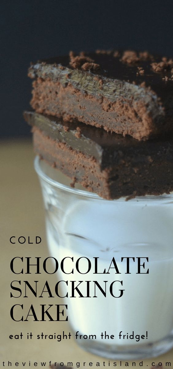 a stack of chocolate snacking cake sitting in a glass bowl on top of a table