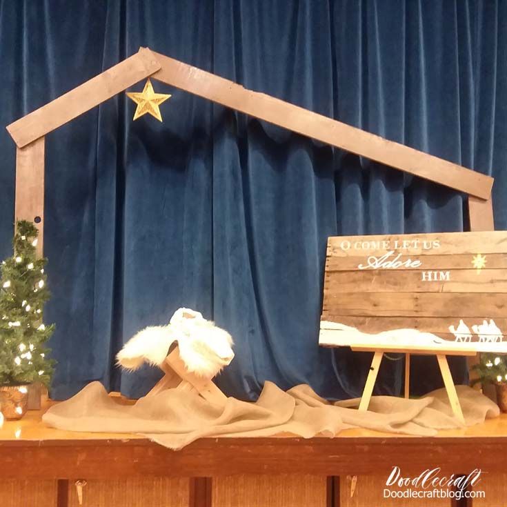 a nativity scene is displayed on a stage