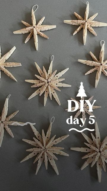 six wooden snowflakes are arranged in the shape of christmas trees, and one is labeled diy day 5