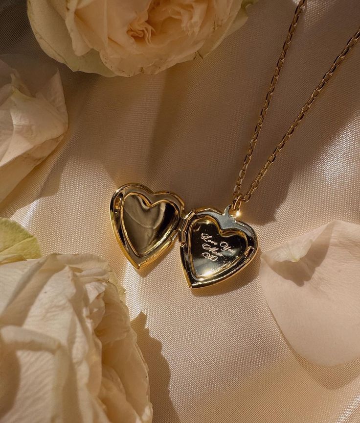 This Mother's Day, we're thrilled to unveil a creation that transcends ordinary gifts, designed for those who hold their mothers in the highest esteem. Our brand-new, meticulously crafted Timeless Locket is more than just a piece of jewelry; it's a vessel of memories, a symbol of unbreakable bonds, and a testament to the enduring love shared between a mother and her child. Material: 18K Gold Plated Brass Pendant Height: 2cm Chain Length: 16inches + 5cm extender Vintage Open Heart Jewelry For Mother's Day, Vintage Personalized Open Heart Jewelry, Vintage Locket Jewelry As Gift For Her, Vintage Locket Jewelry As A Gift For Her, Elegant Locket Jewelry Gift, Vintage Locket Jewelry Gift For Her, Heirloom Engraved Locket Necklace For Valentine's Day, Spiritual Engraved Jewelry Gift For Her, Spiritual Engraved Jewelry For Her