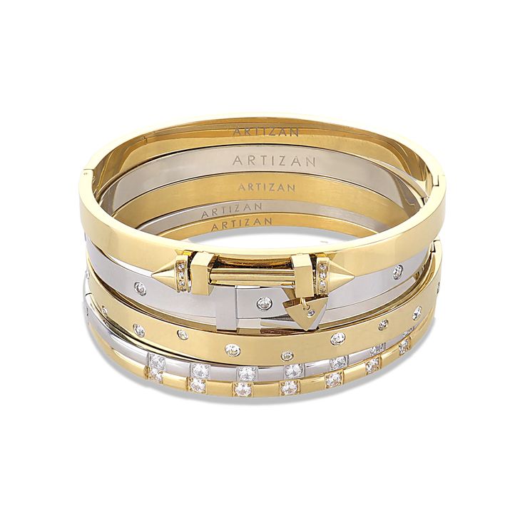 The Triangle Stack, a five-piece bangle set featuring gold and silver bangles with cubic zirconia accents and a triangle clasp detail. Bracelets Layered, Bangle Stack, Jewelry Stack, Layering Jewelry, Vacation Clothes, Gold Rings Stackable, Crystal Bangle, Stacked Bangles, Stacked Jewelry