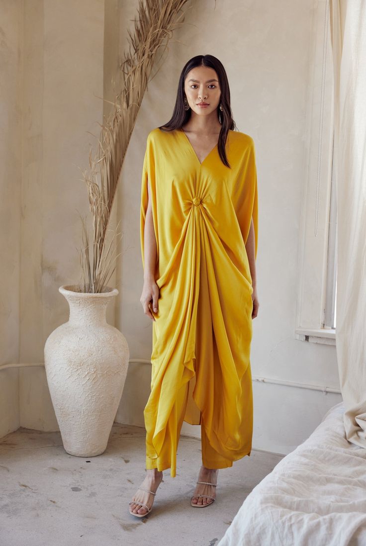 Celebrate in style with this eye-catching yellow silk draped kaftan set, boasting a relaxed fit that puts comfort first. Drape Coord Set, Kaftan For Haldi Function, Kaftan Dress Modern, Draped Kaftan, Turkish Kaftan, Yellow Kaftan, Boho Attire, Short Kaftan Dress, Kaftan Set