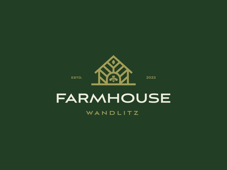 the farm house logo is shown on a dark green background with gold trimmings