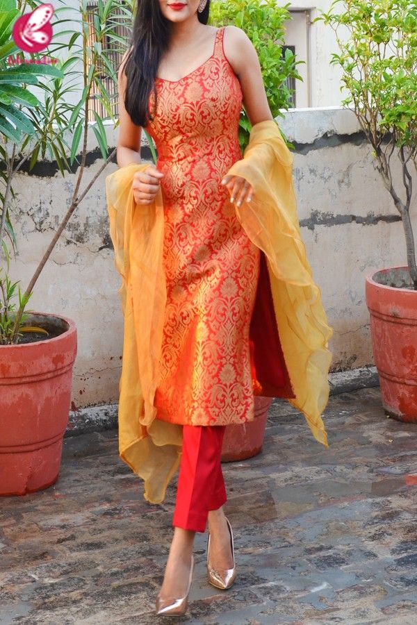 Red Golden Brocade Padded Kurti with Red Cotton Silk Pants and Golden Organza Ruffle Dupatta Red Chudidhar Designs, India Kurta For Women, Salwar Dress Designs, Silk Saree Salwar Suit, Kanjivaram Suit Designs, Festive Wear Indian Kurti, Suit Design With Pants, Ruffle Kurti Design, Banarasi Silk Kurta Set