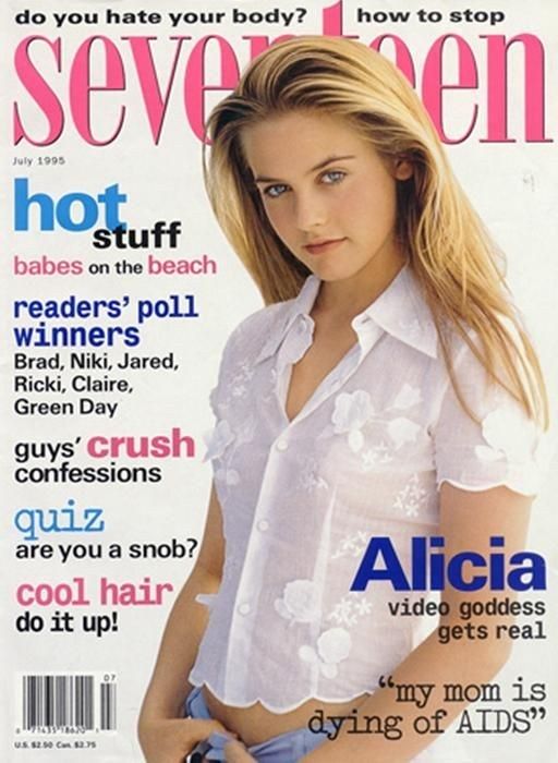 a magazine cover with a woman in white shirt