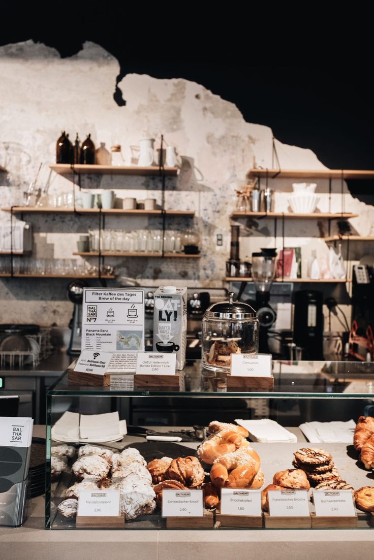 there are many different types of pastries on display