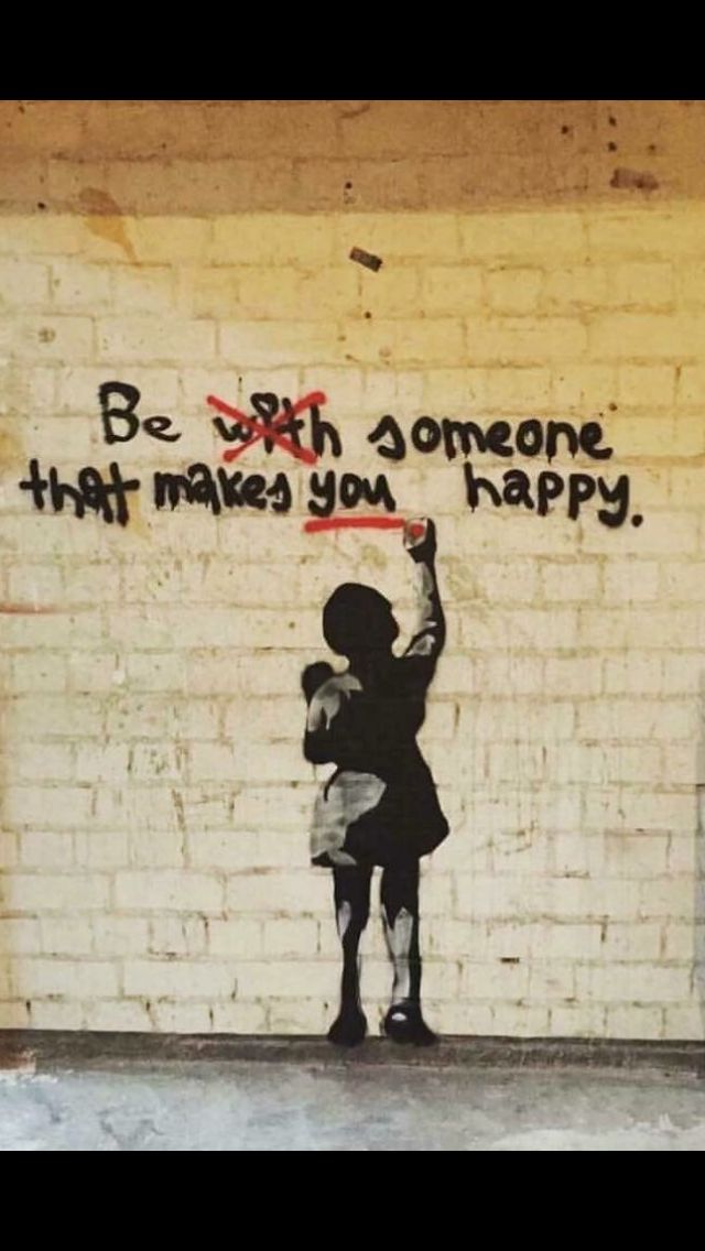 two children standing in front of a brick wall with graffiti on it and the words be both someone that makes you happy