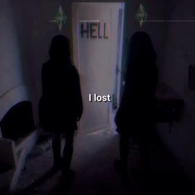 two people standing in front of a door with the words hell on it and i lost