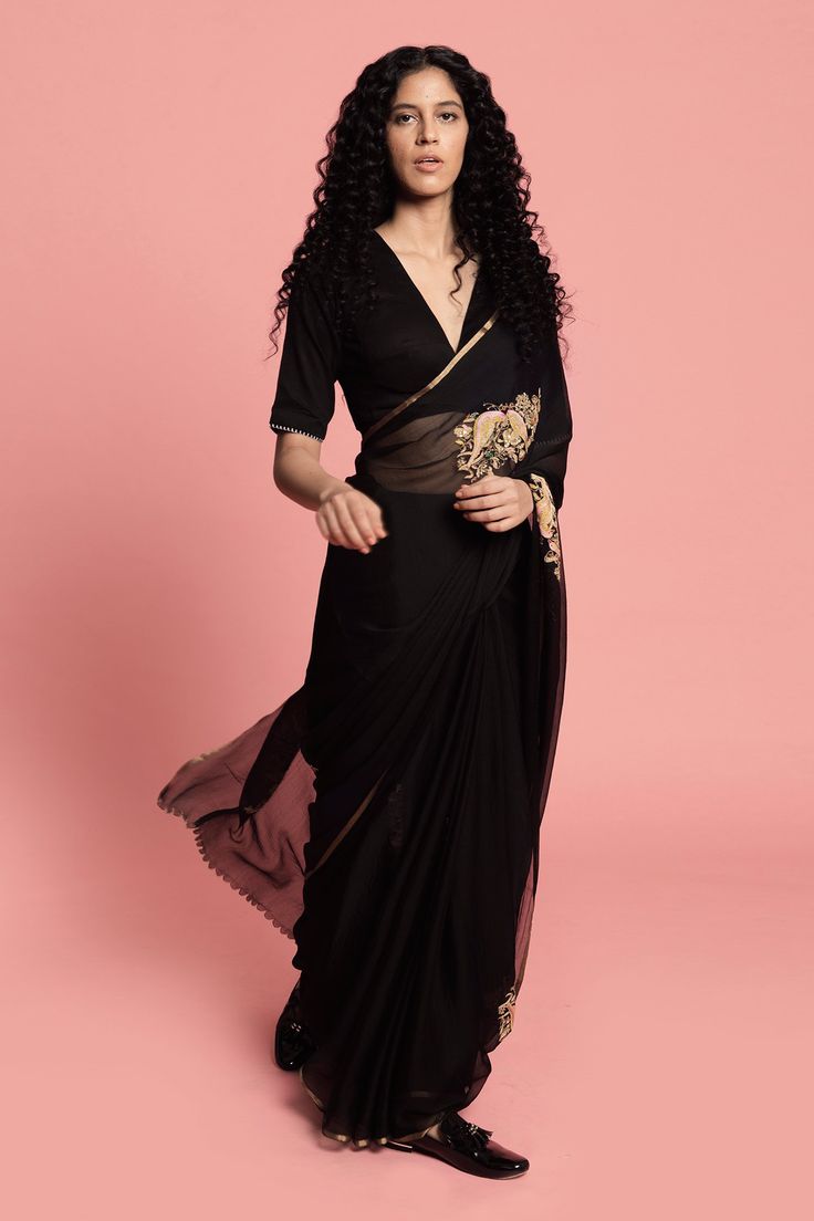 Black saree with floral, bird embroidered motifs. Paired with V-neck blouse.
Component: 2
Embroidered
Neckine: V neck
Sleeve Length: Short
Fabric: Chiffon Silk
Color: Black
Floral motif work - Aza Fashions Label Earthen, Black Saree Blouse, Black Blouse Designs, Fashionable Saree, Cotton Saree Blouse Designs, Saree Wearing Styles, Simple Saree Designs, Fashionable Saree Blouse Designs, Fancy Sarees Party Wear