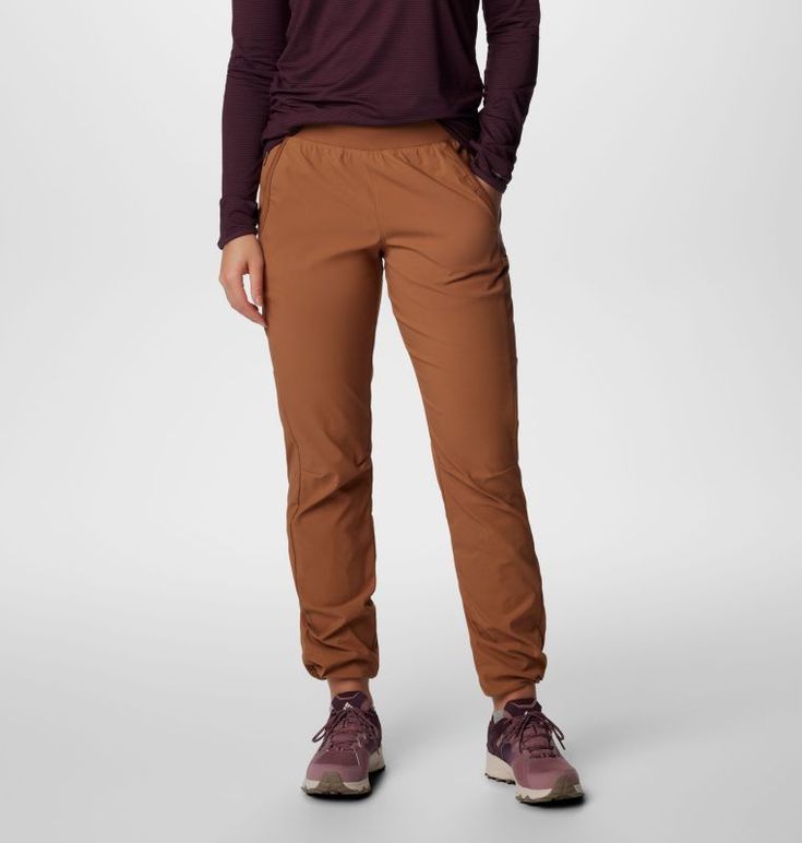 Easy-wearing pants that are up for anything, designed with plenty of pockets, a comfortable pull-on waistband, UPF 50 sun protection and stain-defying tech. Fall Travel Bottoms With Pockets, Travel Bottoms With Pockets For Fall, Functional Travel Pants With Elastic Waistband, Functional Pants With Elastic Waistband For Travel, Fall Midweight Bottoms With Pockets, Functional Brown Bottoms For Outdoor Activities, Fall Bottoms With Elastic Waistband, Functional Fall Bottoms With Elastic Waistband, Moisture-wicking Stretch Bottoms For Travel