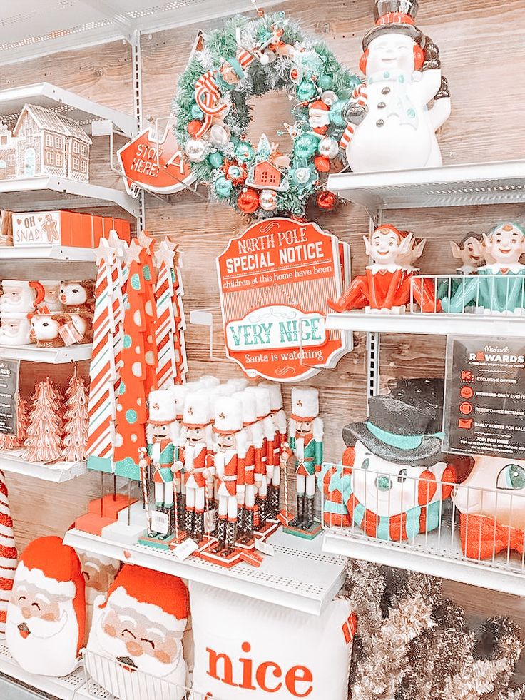 a christmas display in a store filled with candy canes and other holiday decorations on shelves