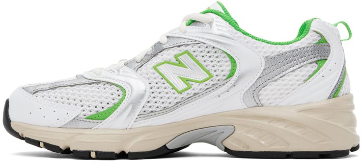 Low-top paneled mesh and faux-leather sneakers in white and green. · Perforated detailing throughout · Lace-up closure · Logo printed at padded tongue · Padded collar · Logo appliqué at sides · Pull-loop at heel tab · Logo printed at padded footbed · Mesh lining · Sculptural ABZORB® rubber midsole · Logo embossed at treaded rubber sole Supplier color: White/Green New Balance White Mesh Sneakers, New Balance Running Shoes With Perforations For Streetwear, New Balance Streetwear Running Shoes With Perforations, New Balance Perforated Running Shoes For Streetwear, White New Balance Running Shoes With Perforations, Green New Balance Running Shoes With Laces, New Balance White High-top Running Sneakers, New Balance Sneakers With Vented Sides For Streetwear, New Balance Green Sneakers For Streetwear