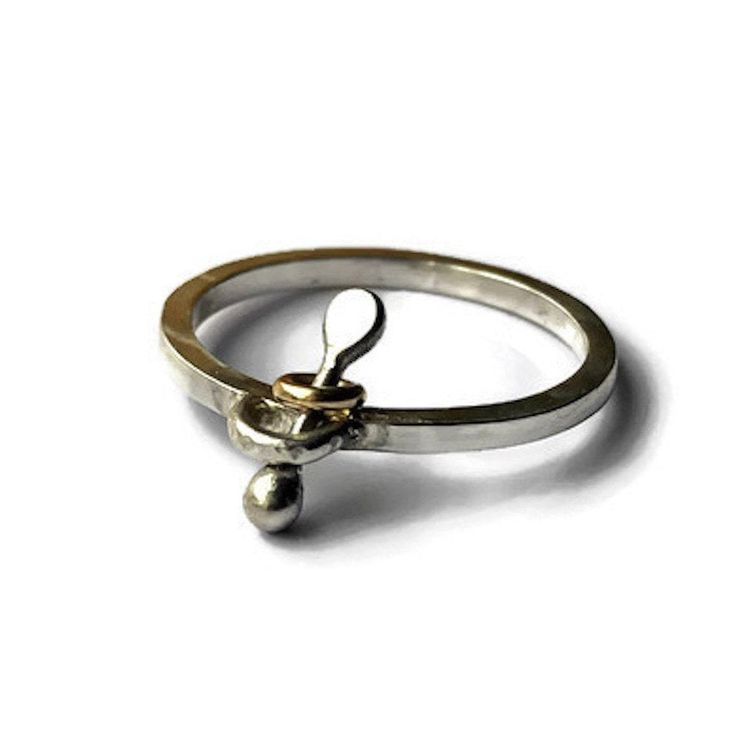 This unique fidget ring is one of a kind, it is an original creation that is strong and comfortable. All handmade, the silver linked bar has one balled side and the other side in a paddle shape. The bar moves up and down through the centre loop that is attached directly to the band. The gold linked ring adds a little extra to fiddle with, it is perfect for everyday and looks great stacked. Made of -  *  14 gauge (2 mm) square sterling silver, a thick, very strong ring. *  1 x 14K gold filled rin Sterling Silver Cleaner, Original Jewelry Design, Meditation Ring, Cleaning Silver Jewelry, Jewelry Cleaning Solution, Worry Ring, Fidget Rings, Meditation Rings, Linking Rings