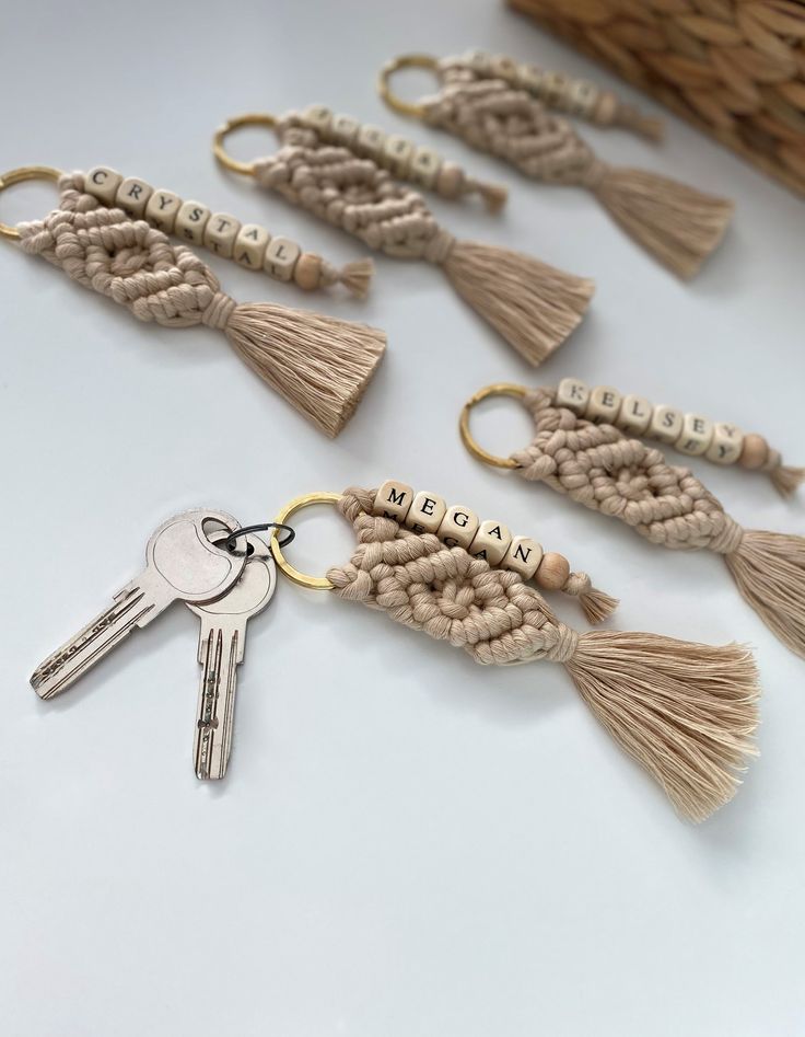 several key chains with tassels and the words made in wood letters on them