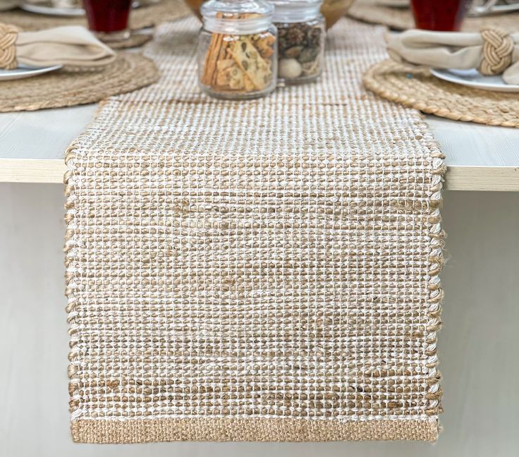 PRICES MAY VARY. MATERIALS: Our weavers use all natural Jute fibers and intertwine them with recycled cotton yarns to make not only environmentally friendly but also elegant and trendy table runners . Style your tables for any dinner party or occasion with our ultra-chic and luxurious Jute table linen that is also eco-friendly. CONTENTS: Package contains one Jute/ upcycled cotton Table Runner. We also have matching table mats and napkins available HANDCRAFTED: Our weavers ensure that these heavy Jute Table Runner, Hand Woven Table Runner, Farmhouse Table Runner, Rustic Farmhouse Table, Farmhouse Table Runners, Dining Table Runners, Fabric Table Runner, Runner Table, Hot Plates