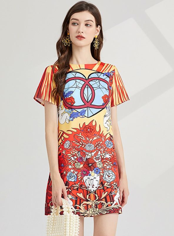 Carnival of Hue: This vibrant, stained glass-inspired dress is a wearable piece of art, flaunting a bold palette of red, yellow, and blue, intermingled with striking patterns that catch the eye. The short-sleeve design, coupled with the A-line silhouette, offers a casual yet flattering fit that moves with grace and ease. It's a piece that celebrates color and creativity, making it a perfect choice for those who love to stand out in a crowd. The kaleidoscopic patterns are not just visually compel Kaleidoscopic Patterns, Gallery Opening, Printed Short Dresses, Minimal Accessories, Color Festival, Stand Out In A Crowd, Yellow And Blue, Inspired Dress, Mini Dress Party