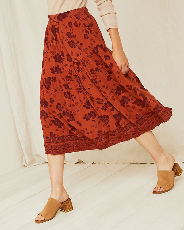 Whether you're headed to a meeting or to the market, keep the mood light and airy in this crêpe midi skirt. Fashioned with an elastic waist for pull-on ease and an angled seam for a unique and eye-catching twist.  Exclusive. Elastic waist. Angled pockets. Flowy Summer Midi-length Bottoms, Flowy Rayon Maxi Skirt For Spring, Flowy Tiered Viscose Skirt, Summer Viscose Maxi Skirt, Flowy Viscose Maxi Skirt For Summer, Summer Flowy Viscose Maxi Skirt, Summer Viscose Flowy Maxi Skirt, Flowy Rayon Gathered Skirt, Flowy Rayon Tiered Skirt