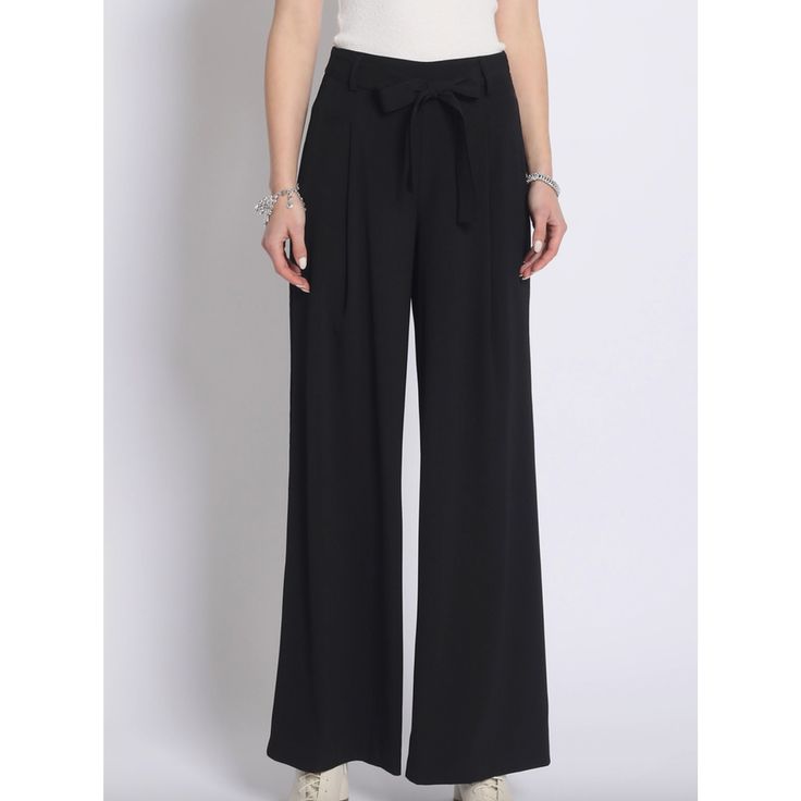 Super chic black wide leg pants with tie waist detail. Excellent quality material. Runs true to size. Model is wearing size small. Evening Wide Leg Belted Bottoms, Versatile Belted Wide Leg Pants, Elegant High Waist Belted Wide Leg Pants, Elegant Full Length Belted Wide Leg Pants, Chic High-waisted Pants With Tie Waist, Chic High-waisted Tie Waist Pants, Elegant Belted Solid Wide Leg Pants, Elegant Solid Color Belted Wide Leg Pants, Chic Tie Waist Bottoms For Workwear