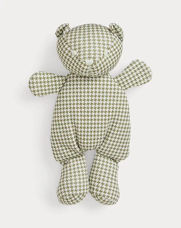 a green and white checkered teddy bear