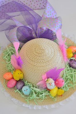 a straw hat with easter decorations on it