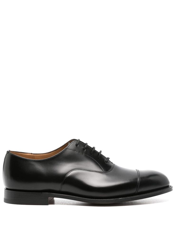 black calf leather tonal stitching front lace-up fastening almond toe branded leather insole flat leather sole stacked heel Designer Black Plain Toe Oxfords, Classic Black Calf Leather Lace-up Shoes, Calf Leather Wingtip Lace-up Shoes For Derby, Black Masculine Plain Toe Oxfords, Luxury Black Leather-lined Oxfords, Balenciaga Track, Balenciaga Triple S, Athletic Sneakers, Summer Beach Wear