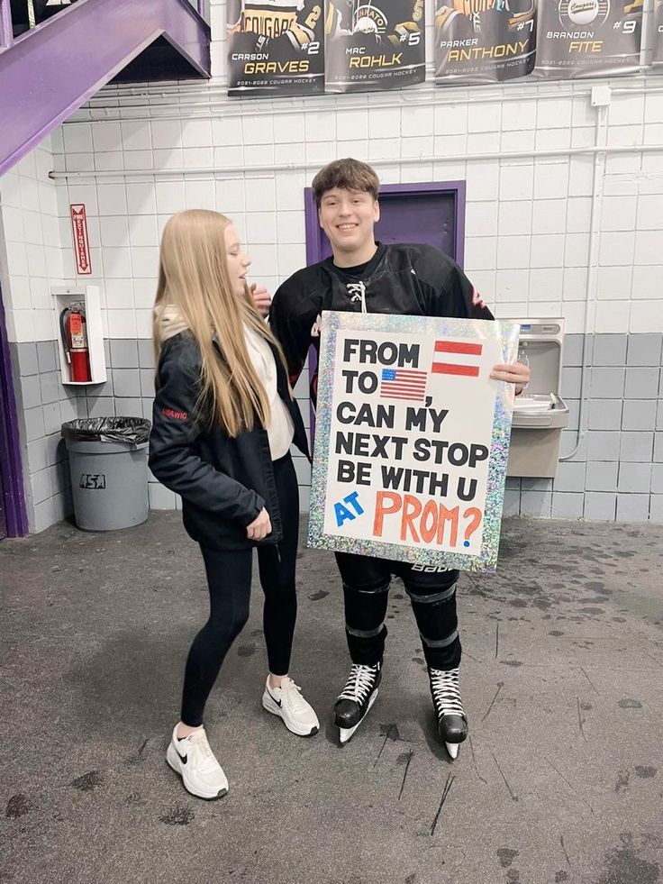 two people standing next to each other holding a sign that says from to can my text stop be with you