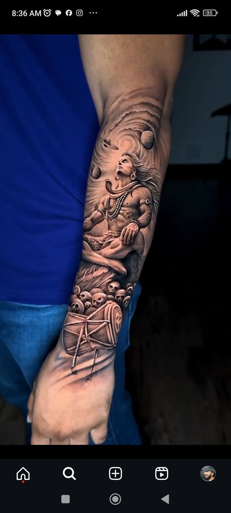 a person with a tattoo on their arm