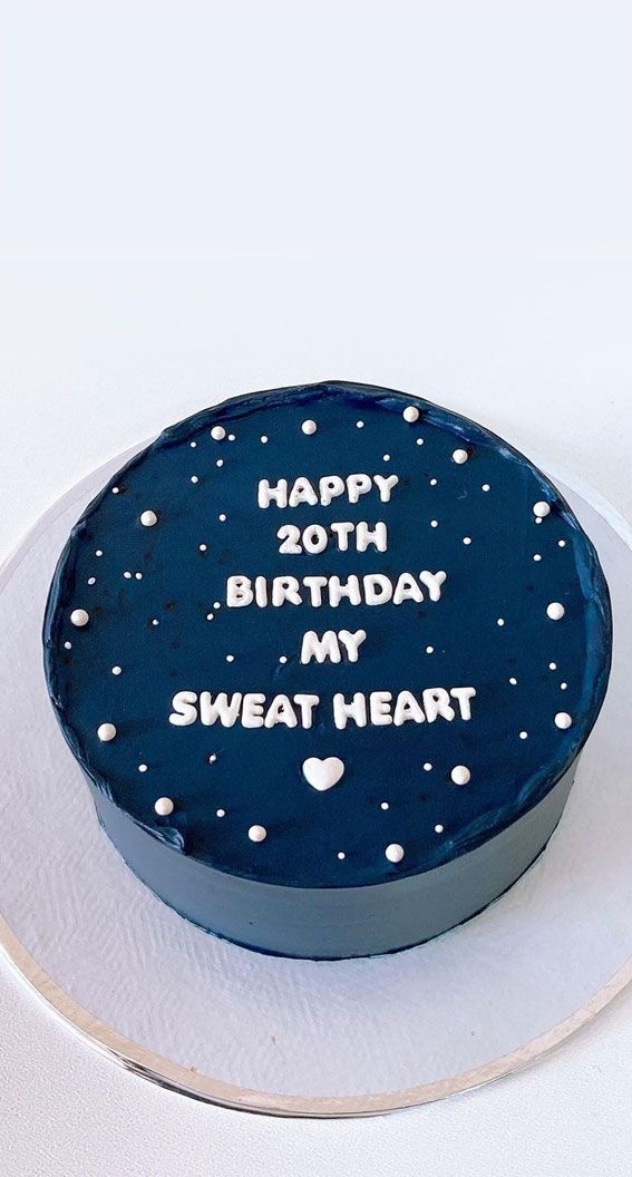 a blue birthday cake with white frosting that says happy birthday my sweat heart