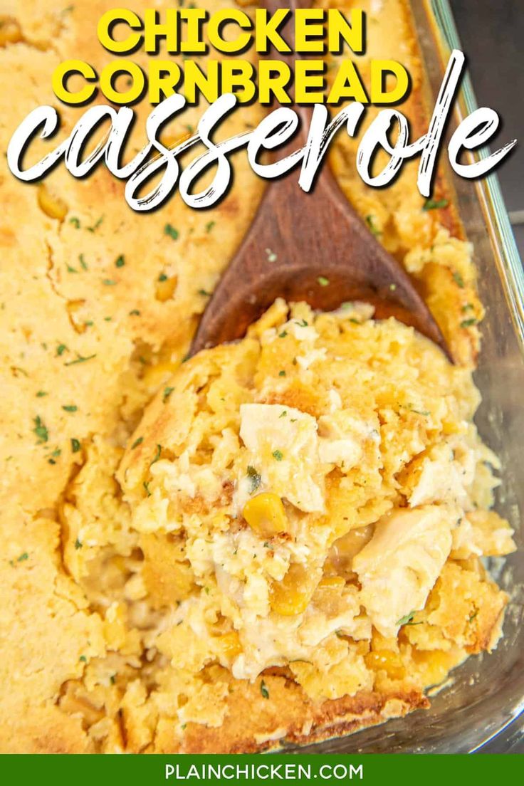 chicken cornbread casserole in a glass dish with a wooden spoon