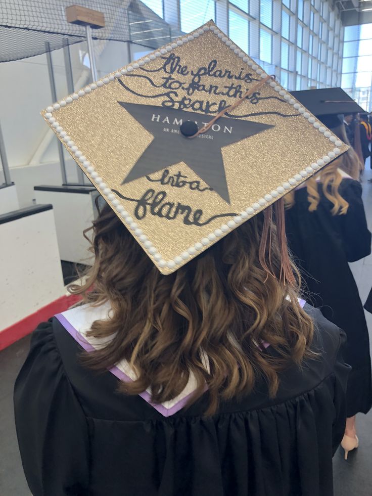 a graduation cap that reads, the atlantic is proud and has an image of a star on it