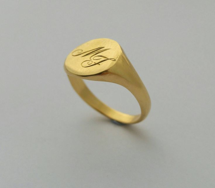 "A classic hand engraved signet ring for men or women. A beautiful 14K yellow gold signet ring. This ring will be especially beautiful as a pinky ring will look great on any finger you choose to wear it. The ring is not hollowed and has a shiny finish, also on the inside. This ring can be customized: It can be hand engraved to up to 3 letters. The engraving can be made with a font of your choosing - you can even write it in your own handwriting - nothing is more personalized than this <3 This Classic Signet Ring With Initials For Promise, Timeless Engraved Signet Ring For Wedding, Timeless Personalized Signet Ring For Wedding, Classic Open Signet Ring Stamped 14k, Formal Engraved Ring With Engraving Option, Engraved Yellow Gold Signet Ring For Anniversary, Personalized 14k Gold Signet Ring For Formal Events, Timeless Signet Ring With Engraving Option As Gift, Timeless Signet Ring As Gift