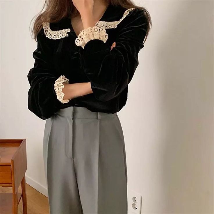 Velvet & Lace Romantic Vintage Style Blouse with long sleeves, buttons through front and lace decorated collar and sleeves. size S Length 62cm bust 92cm shoulder width 37cm size M Length 63cm bust 96cm shoulder width 38cm size L Length 64cm bust 100cm shoulder width 39cm size XL Length 65cm bust 104cm shoulder width 40cm Material: COTTON, Polyester Black Long Sleeve Blouse With Lace Cuffs, Winter Long Sleeve Lace Patchwork Top, Fall Long Sleeve Blouse With Lace Sleeves, Fall Blouse With Long Lace Sleeves, Formal Long Sleeve Blouse With Lace Trim, Long Sleeve Lace Trim Blouse For Work, Workwear Blouse With Lace Long Sleeves, Winter Lace Long Sleeve Tops, Fall Lace Patchwork Long Sleeve Blouse