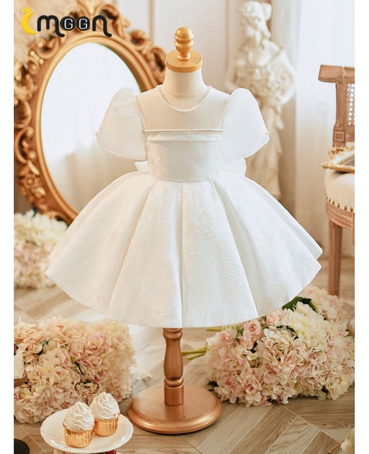 Get 10% off now! Buy couture elegant white folwer girl dress with pearls at cheap price online. Free stable shipping and pro custom service since 2009. Elegant Spring Princess Dress With Fitted Bodice, White Short Sleeve Princess Baptism Dress, Summer First Communion Fitted Princess Dress, White Princess Style Baptism Dress For Summer, White Princess Baptism Dress For Summer, Elegant Spring Baptism Party Dress, Fitted White Princess Dress For Party, White Fitted Princess Dress For Party, Elegant Princess Dress For First Communion In Spring