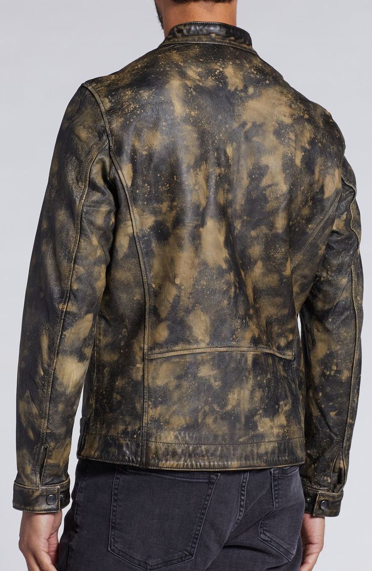 This luxurious leather bomber jacket features a worn camo dyed look and is a versatile outerwear staple that's sure to add the missing touch to any outfit! Stand collar Long sleeves Zipper front Zipper pockets Signature logo lining & pullers Shift cuff snaps All-over camo pattern Leather construction Lined Shell: 100% leather; lining: 100% silk Spot clean Imported Model stats: 6'1" height, 32" waist. Model is wearing size M. Distressed Leather Outerwear For Streetwear, Rugged Long Sleeve Distressed Leather Jacket, Rugged Faded Outerwear For Fall, Casual Distressed Leather Biker Jacket, Brown Post-apocalyptic Outerwear For Fall, Rugged Distressed Outerwear In Faded Color, Rugged Faded Distressed Outerwear, Rugged Distressed Faded Outerwear, Rugged Distressed Leather Jacket For Streetwear