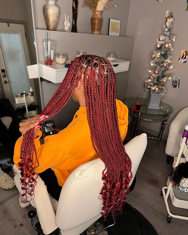 Red Knotless Box Braids With Curls, Red Braids Knotless With Curls, Ruby Red Knotless Braids, Red Knot Less Braids With Curls, Peekaboo Knotless Braids With French Curls, Red Peak A Boo Knotless Braids, Dark Red Braids With Curls, Red Braids With Curls At The End, Maroon Knotless Braids With Curls