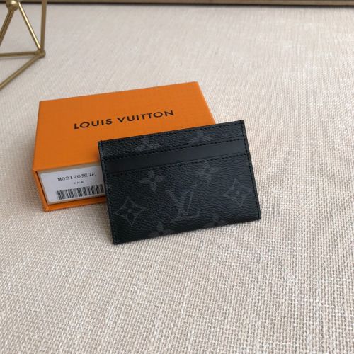 Sleek and stylish, this card holder in new Monogram Eclipse coated canvas is compact enough to slip easily in your pocket. Features a central pocket and four slots for credit cards, air and train tickets, and business cards. Size: 11×7×1.5cm Lv Card Holder, Louis Vuitton Card Holder, Louis Vuitton Yayoi Kusama, Iphone Leather, Black Louis Vuitton, Mens Card Holder, Louis Vuitton Capucines, Large Cosmetic Bag, Lv Purse