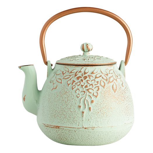 a tea pot with a wooden handle on it