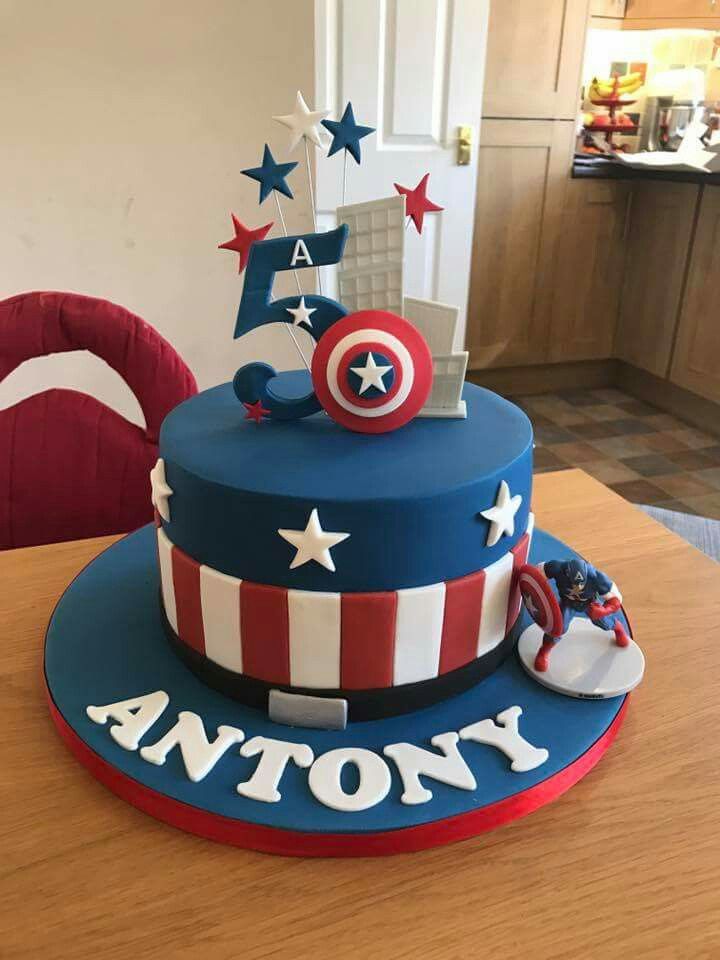 a captain america themed birthday cake on a table