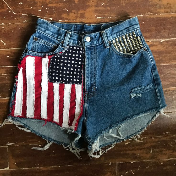 PEGGYOWASHERE™ CUT OFF  DENIM  SHORTS Ragged handmade American Flag cotton patch ZIPPER   FLY STUDs  ON THE FRONT  POCKET size APPROX.10 US  28 INCH  HIGH WAIST  32 waist measured at pockets 13 INCH RISE 26 INCH LEG OPENING 13 INCH SIDE SEAM hip 44 Denim Festival, Outfit Pieces, Summer Swag, Festival Shorts, American Flag Print, Cut Offs, Pocket Size, Cut Off, Front Pocket