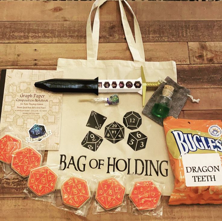 a bag with dice and other items on it