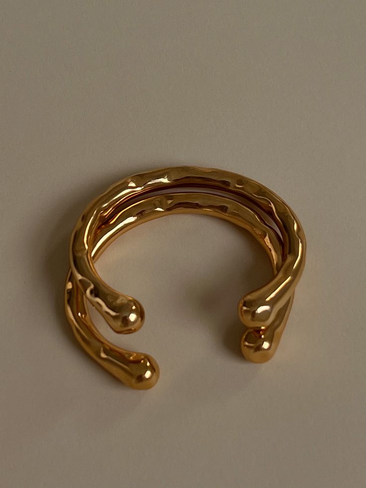 Bone Cuff Gold – Knature The Label Adjustable Hammered Gold Bangle, Modern Gold Double Band Cuff Bracelet, Adjustable Double Band Gold Bangle, Adjustable Gold-plated Bangle With Polished Finish, Gold Double Band Cuff Bracelet As Gift, Adjustable Open Ring Yellow Gold Bracelet, Gold Double Band Bangle As A Gift, Gold Metal Stackable Cuff Bracelet, Tarnish Resistant Yellow Gold Brass Cuff Bracelet