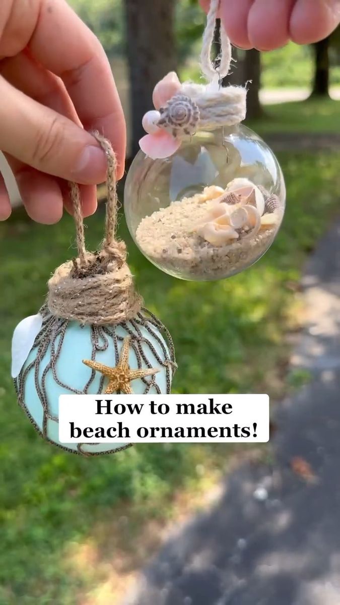 someone is holding a glass ornament with sand in it and the words how to make beach ornaments?