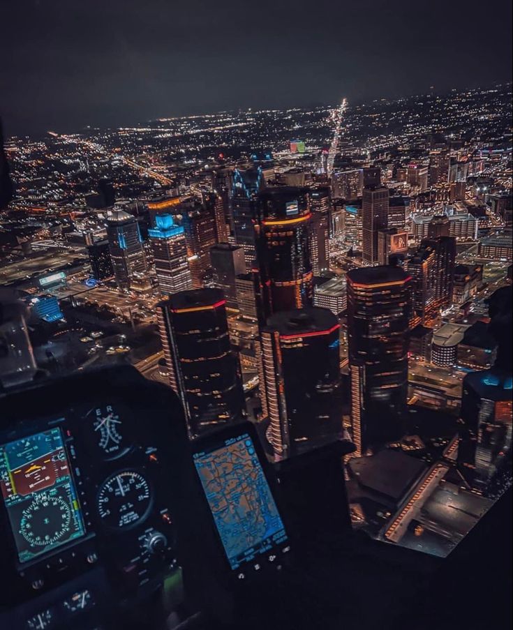 an aerial view of a city at night