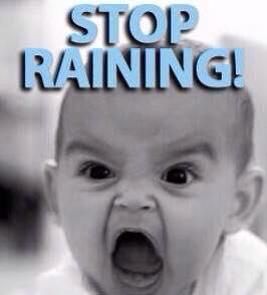 a baby with its mouth open and the words stop raining above it