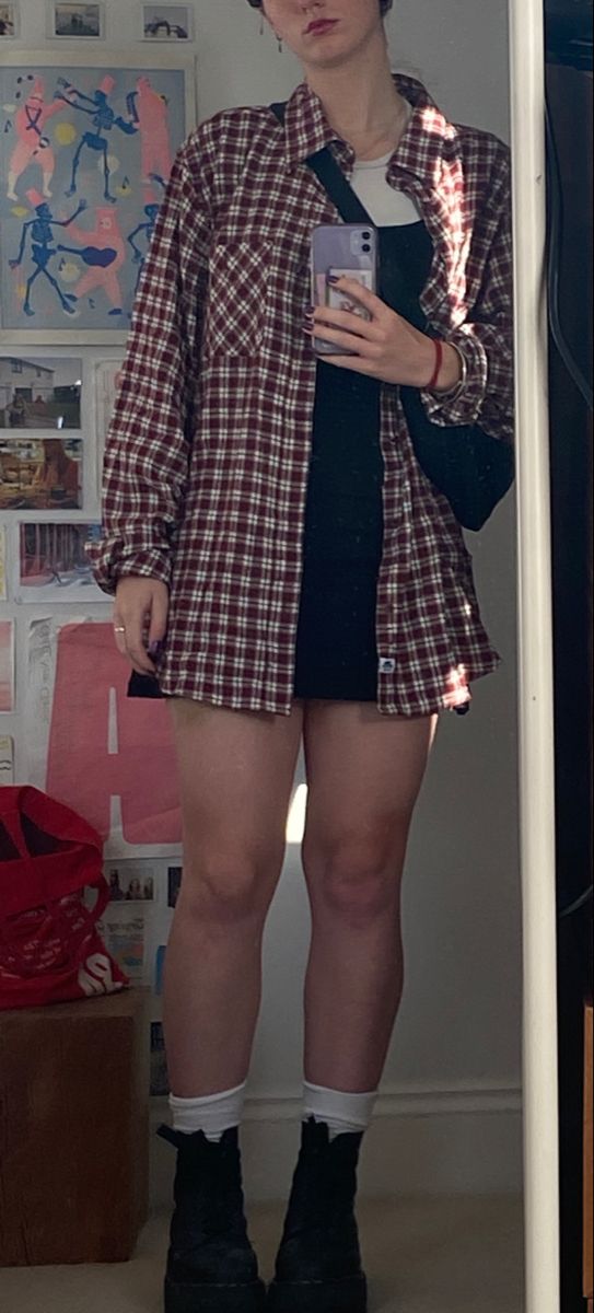 90s inspired rachel green casual outfit. Flanel plaid shirt with black mini dress and white top underneath. Platform doc martens Green And White Flannel Outfit, Dress With Flannel Outfit, Green Plaid Shirt Outfit, 90s Flannel Outfits, Flannel Dress Outfit, Green Casual Outfit, Dress With Flannel, White Flannel Outfit, Platform Doc Martens