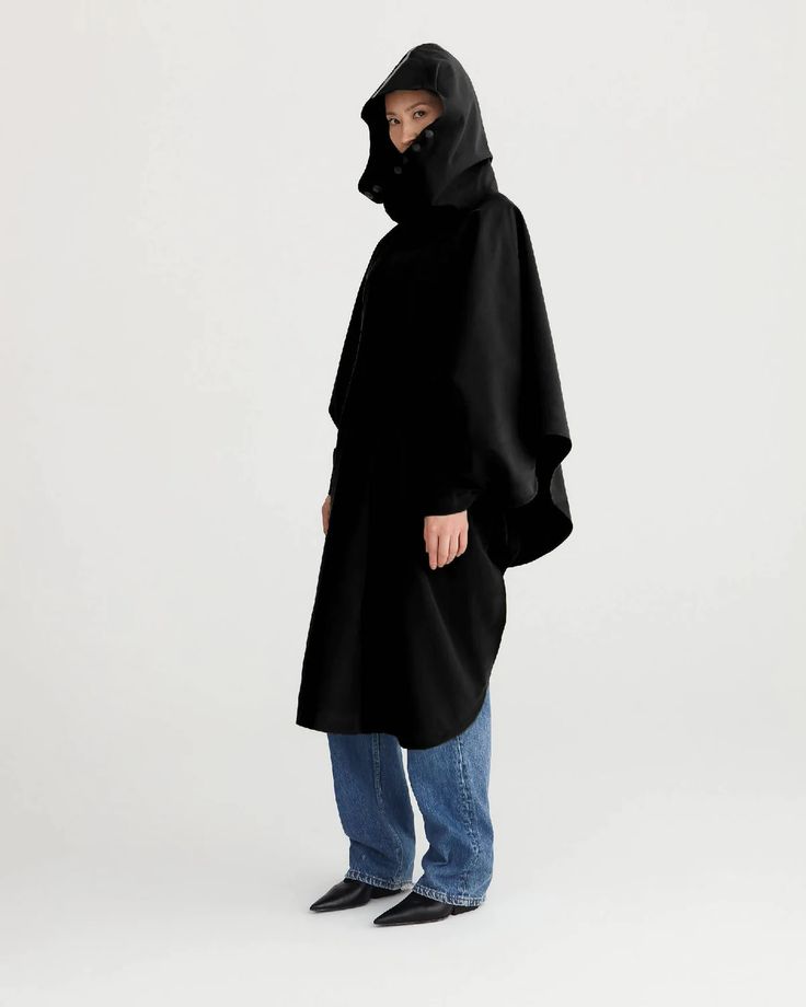 raincoat-rgegnjas-bybrown-amsterdam-black-cycling | NOT JUST A LABEL Black Waterproof Outerwear, Winter Black Raincoat With Storm Flap, Black Winter Outerwear For Weather Protection, Black Winter Outerwear For Protection, Black Outerwear For Winter Weather Protection, Black Waterproof Outerwear For Protection, Modern Waterproof Raincoat For Rainy Weather, Urban Black Raincoat For Fall, Modern Raincoat For Rainy Winter Weather