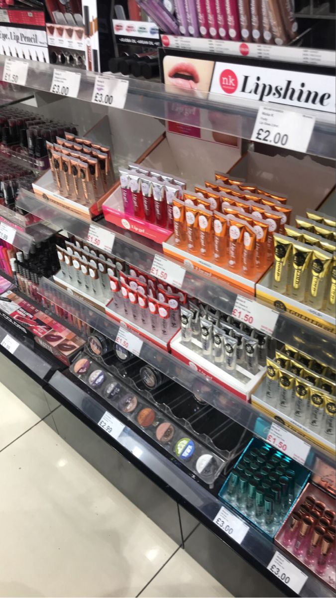 an assortment of cosmetics on display in a store