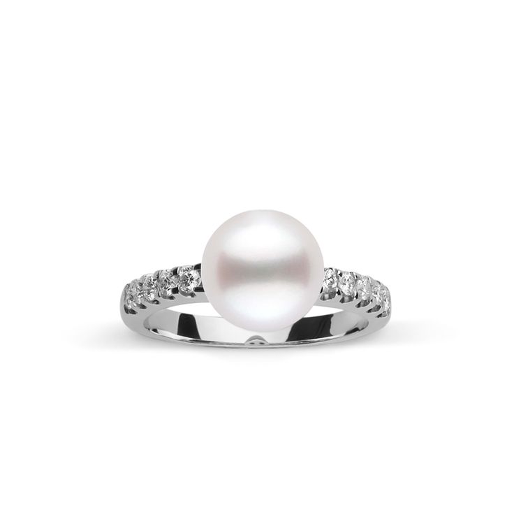 This 9.0-10. mm AAA quality White South Sea pearl ring showcases the pure organic beauty of elegant south sea pearl. The flawless pearl appears to float above the gold, yet is securely attached by a strong post. The classic-style ring features a solid 14-karat gold band that is set with 0.25 carats of diamonds. The ring setting is made in-house and is composed of solid 14 karat gold. We use an extra-fine diamond grade (VS1-G), which is normally reserved for solitaire settings. It's rare to see t Luxury Akoya Pearl Ring With Pearl Drop, Timeless White Akoya Pearl Ring, White Akoya Pearl Timeless Ring, Luxury Round Ring With Pearl Drop, Luxury Round Pearl Drop Ring, Luxury Akoya Pearl Ring In Pearl White, Timeless Akoya Pearl Drop Ring, White Akoya Pearl Ring With Brilliant Cut, White Akoya Pearl Ring With Pearl Drop